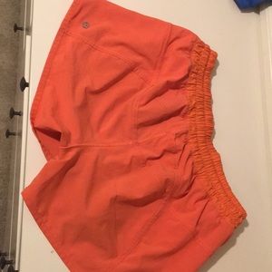 lululemon athletica Shorts - Bright orange tracker short lululemon shorts 4” lululemon athletica Shorts - Bright orange tracker short lululemon shorts 4”